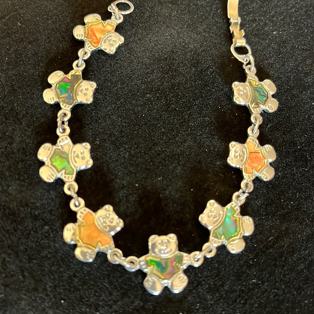 Silver charm bracelet, teddy bears with pastel colored stones, 7.50”L